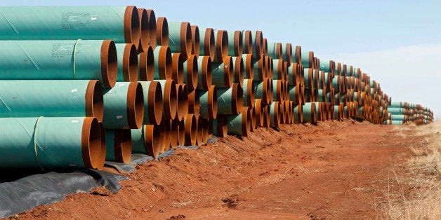 FILE - In this Feb. 1, 2012 file photo, miles of pipe ready to become part of the Keystone Pipeline are stacked in a field near Cushing, Okla. Oklahoma leaders are praising the renewed momentum in Congress to approve the northern leg of the Keystone XL pipeline, although the project will have only a minimal economic impact on the Sooner State.(AP Photo/Sue Ogrocki, File)