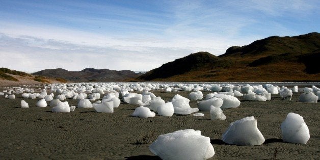 KANGERLUSSUAQ, GREENLAND - SEPTEMBER 01: (ISRAEL OUT) Ice boulders left behind after a flood caused by the overflowing of a l
