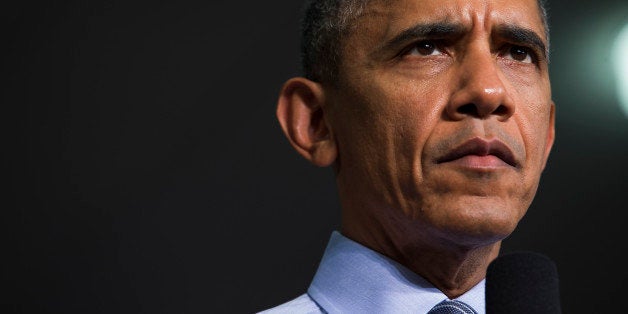 President Barack Obama listens to a question during an event at Ivy Tech Community College, Friday, Feb. 6, 2015, in Indianapolis, where he promoted his budget proposal to make two years of community college free. (AP Photo/Evan Vucci)