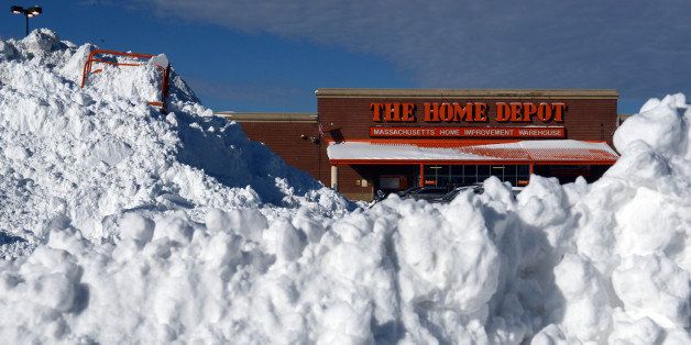 BOSTON, MA - JANUARY 4: Snow is piled up high in front of Home Depot in the South Bay shopping center after a two day winter storm January 4, 2014 in Boston, Massachusetts. The storm began mid day Thursday with heavy snows overnight into Friday bringing with it extreme cold. (Photo by Darren McCollester/Getty Images)