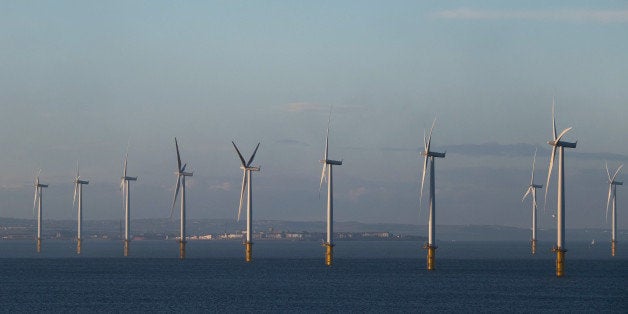 REDCAR, ENGLAND - JANUARY 19: The EDF Energy offshore windfarm sits just off the coastline on January 19, 2015 in Redcar, England. A former Labour stronghold, Redcar, became a Liberal Democrat seat after voters turned away from Labour partly due to the closure of the steel plant in 2010. Steel production began again in 2012 under new management with the town seeing other major developments over recent years. As a marginal seat, the town could play an important part in the 2015 general election. (Photo by Ian Forsyth/Getty Images)