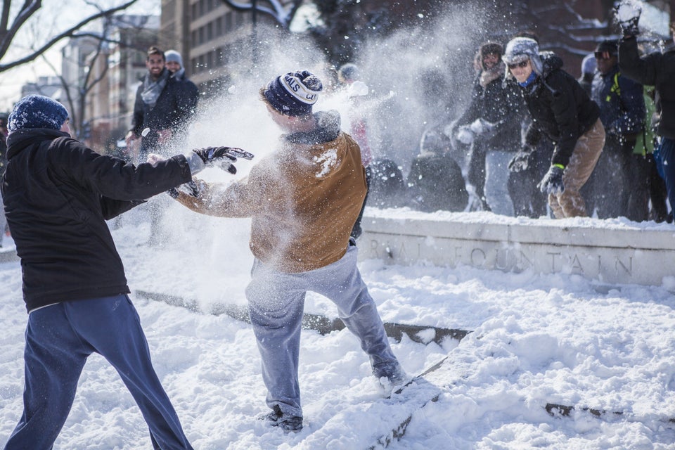 Young Couple in Snowball Fight Stock Photo - Image of friendship, mock: 26942348