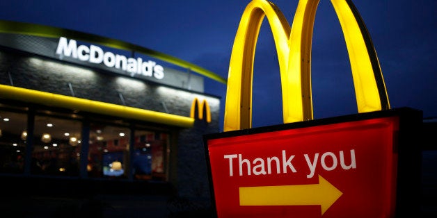 Golden arches mark the entrance to a McDonald's Corp. restaurant in Shelbyville, Kentucky, U.S., at dawn on Friday, Jan. 23,
