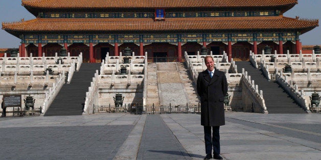 Britain's Prince William faces the media during a visit to the Forbidden City in Beijing, China, Monday, March 2, 2015. William presented China's President Xi Jinping with a large envelope Monday containing an invitation from the queen to visit Britain this year, as he began the first official visit to mainland China by a senior British royal in a generation.(AP Photo/Rolex Dela Pena, Pool)