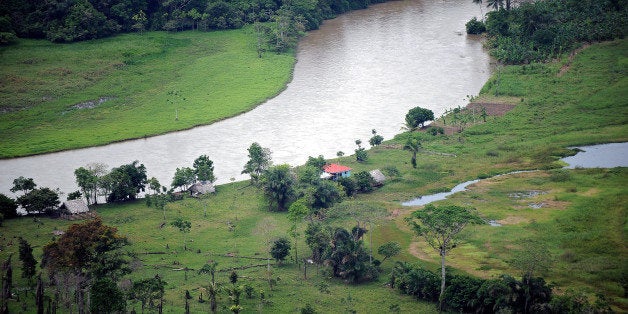 TO GO WITH AFP STORY BY OSCAR NUNEZ OLIVAS - Aerial view of the San Juan River, natural border between Costa Rica (R) and Nicaragua (L), taken on October 24, 2010. Costa Rica's government denounced on Monday the presence of Niocaraguan troops in Costa Rican territory and requested the Secretary General of the Organization of American States (OAS) Jose Miguel Insulza, to convene the Permanent Council of the organism. AFP PHOTO/ Yuri CORTEZ (Photo credit should read YURI CORTEZ/AFP/GettyImages)