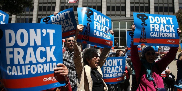 SAN FRANCISCO, CA - MAY 30: Protestors stage a demonstration against fracking in California outside of the Hiram W. Johnson State Office Building on May 30, 2013 in San Francisco, California. Dozens of protesters with the group Californians Against Fracking staged a protest outside of California Gov. Jerry Brown's San Francisco offices demanding that Gov. Brown ban fracking in the state. (Photo by Justin Sullivan/Getty Images)