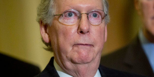 Senate Majority Leader Mitch McConnell, a Republican from Kentucky, speaks during a news conference following a Senate luncheon at the U.S. Capitol in Washington, D.C., U.S., on Tuesday, Feb. 24, 2015. Days before funding for the Department of Homeland Security expires, McConnell is getting a mixed reaction to his plan to separate agency financing from opposition to President Barack Obama's immigration policies. Photographer: Andrew Harrer/Bloomberg via Getty Images 