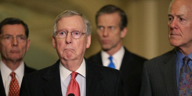 WASHINGTON, DC - FEBRUARY 03: Senate Majority Leader Mitch McConnell (R-KY) talks to reporters with (L-R) Sen. John Barrasso (R-WY), Sen. John Thune (R-SD) and Sen. John Cornyn (R-TX) after the weekly Republican Senate policy luncheon at the U.S. Capitol February 3, 2015 in Washington, DC. Senate Democrats filibustered the legislation to fund the Homeland Security Department because it included a measure to roll back President Obama's executive order on immigration. (Photo by Chip Somodevilla/Getty Images)