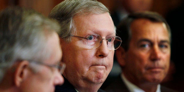 FILE - In this June 16, 2010 file photo, Senate Minority Leader Mitch McConnell of Ky., center, flanked by House Minority Lea
