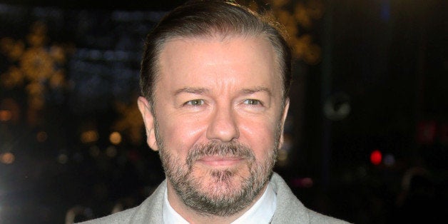 FILE - In this Dec. 15, 2014 file photo, actor Ricky Gervais poses for photographers upon arrival for the premiere of the fil