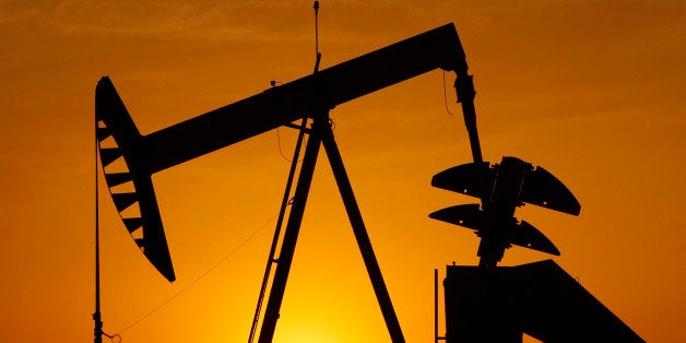 ADVANCE FOR MONDAY, APRIL 30, 2012 ** In this Tuesday, March 22, 20212 file photo, a pumpjack is silhouetted against the setting sun in Oklahoma City. Oklahoma's production tax on natural gas is expected to result in less money for the upcoming state budget because of plummeting natural gas prices, but finance officials say the lost revenue being more than made up by continued high oil prices and an ongoing boom in the stateâs oil patch. (AP Photo/Sue Ogrocki, File)