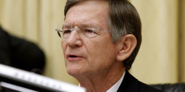 House Judiciary Committee Chairman Rep. Lamar Smith, R-Texas, questions Attorney General Eric Holder on Capitol Hill in Washington, Thursday, June 7, 2012, during the committee's oversight hearing on the Justice Department. (AP Photo/Charles Dharapak)