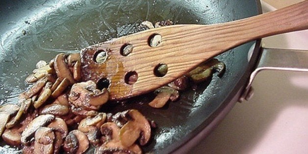 Thrifted Calphalon 12" non-stick fry pan (bought in 2007 in like new condition) and thrifted wooden utensil I've used for years