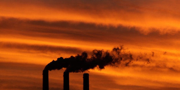 In this Sunday, Dec. 2, 2012 photo, a flock of Geese fly past the smokestacks at the Jeffrey Energy Center coal power plant as the suns sets near Emmett, Kan. Worldwide levels of the chief greenhouse gas that causes global warming have hit a milestone, reaching an amount never before encountered by humans, federal scientists said Friday, May 10, 2013. Carbon dioxide was measured at 400 parts per million at the oldest monitoring station in Hawaii which sets the global benchmark. The last time the worldwide carbon level was probably that high was about 2 million years ago, said Pieter Tans of the National Oceanic and Atmospheric Administration. (AP Photo/Charlie Riedel)