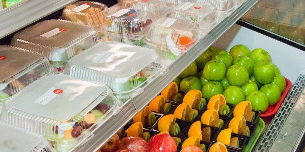 Healthy choices of fresh fruit, salads, tuna fish sandwiches, vegetables and ham and cheese wraps at Washington-Lee High School in Arlington, Virginia for lunch service on Wednesday, October 19, 2011. The fruit, salads, sandwiches, vegetables and wraps are made available through the National School Lunch Program. The National School Lunch Program is a federally assisted meal program administered by the United States Department of Agriculture, Food and Nutrition Service operating in public, nonprofit private schools and residential child care institutions. It provides nutritionally balanced, low-cost or free lunches to children each school day. USDA Photo by Bob Nichols.