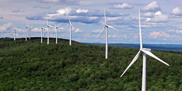 FILE- In this file photo made July 14, 2009, wind turbines line a ridge on Stetson Mountain in Stetson, Maine. The state became the regional wind power leader under Democratic Gov. John Baldacci, but change is in the air as Gov. Paul LePage makes an aggressive push away from his predecessorâs renewable energy policies. The outspoken Republican, who says wind power is too expensive, is looking to hydropower from Canada and natural gas to bring down electricity prices that are among the highest in the country. (AP Photo/Robert F. Bukaty, File)