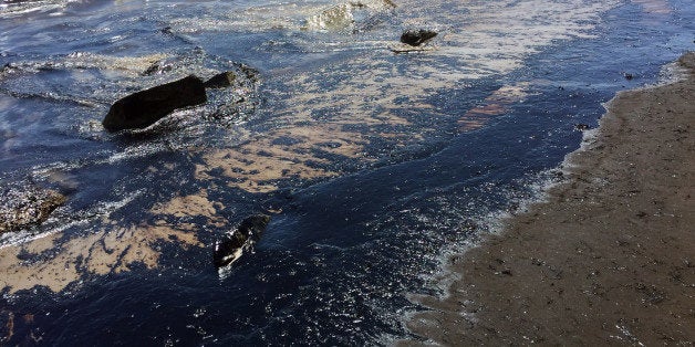 This photo provided by the Santa Barbara County Fire Department shows an oil slick from a broken pipeline off the central California coast near Santa Barbara on Tuesday, May 19, 2015. Capt. Dave Zaniboni of the Santa Barbara County Fire Department says the pipeline on the land near Refugio State Beach broke Tuesday and spilled oil into a culvert that ran under the U.S. 101 freeway and into the ocean. (Mike Eliason/Santa Barbara County Fire Department via AP)