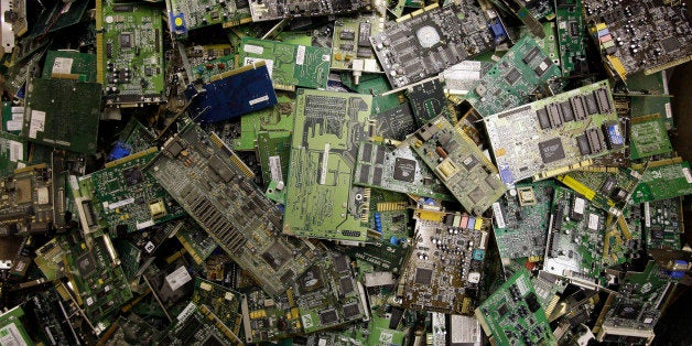 In this Aug. 27, 2009 photo, circuit boards fill a bin at a recycling center in Indianapolis, at Workforce Inc., a nonprofit electronics recycler that contracts with the city of Indianapolis to recycle electronic waste the city collects at hazardous household waste drop-off sites. (AP Photo/Michael Conroy)