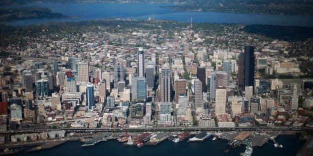 Seattle skyline as seen from Air Force One with President Barack Obama aboard, after departure at King County International airport, , Thursday, May 10, 2012, in Seattle. Obama traveled to the West Coast for a series of democratic party fundraisers. (AP Photo/Pablo Martinez Monsivais)