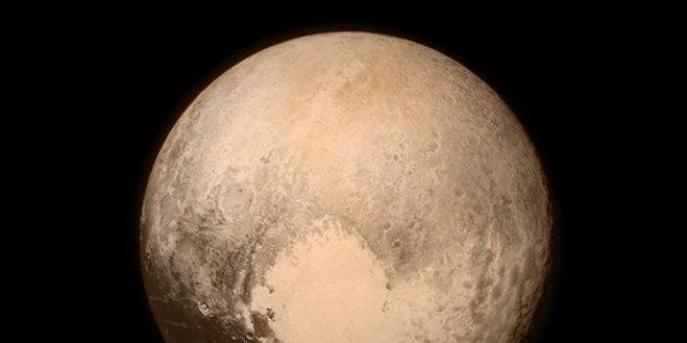 This July 13, 2015 image provided by NASA shows Pluto, seen from the New Horizons spacecraft. The United States is now the only nation to visit every single planet in the solar system. Pluto was No. 9 in the lineup when New Horizons departed Cape Canaveral, Fla, on Jan. 19, 2006 (NASA via AP)