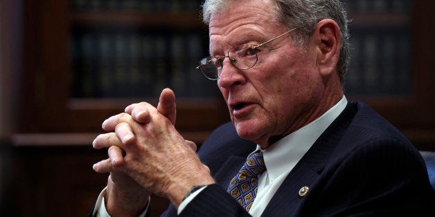 In this photo taken Jan. 7, 2015, Senate Environment Committee Chairman Sen. James Inhofe, R-Okla. speaks to reporters on Cap