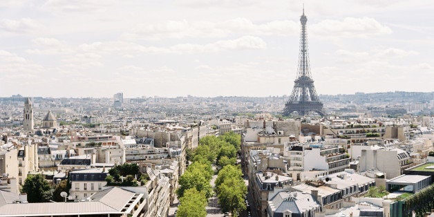 Aerial view of Paris and roof of Arch.