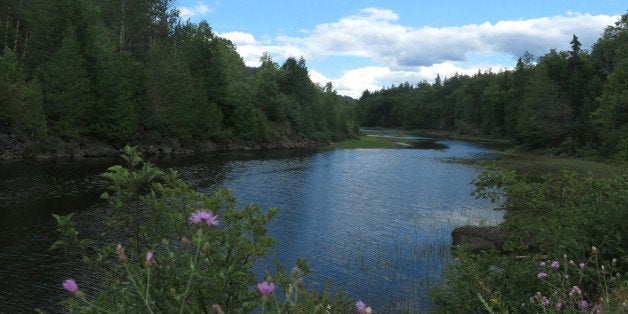 This Aug. 8, 2015 photo shows the Hudson River near an abandoned iron mine in the Adirondacks in Tahawus, NY. A short-line ra