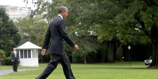 WASHINGTON, DC - OCTOBER 4: U.S. President Barack Obama walks towards Marine One on the South Lawn prior to his departure from the White House October 4, 2015 in Washington, DC. Obama is speaking at the 34th National Fallen Firefighters Memorial Service in Emmitsburg, Maryland. (Photo by Olivier Douliery-Pool/Getty Images)