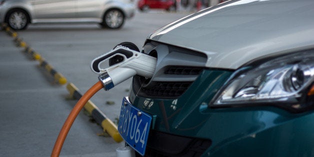 BEIJING, CHINA - 2014/12/16: A charging station for electric cars. To fight the 'war on pollution' , Chinese government is increasing public and private charging facilities to encourage the development of electric vehicle market. (Photo by Zhang Peng/LightRocket via Getty Images)