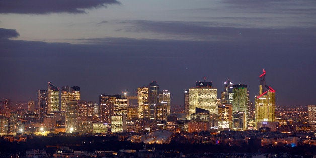 PARIS, FRANCE - DECEMBER 02: The business district of La Defense by night is seen from the Eiffel Tower on December 02, 2015 in Paris, France. France hosts climate change conference COP21 in Paris from November 30 to December 11, 2015. (Photo by Chesnot/Getty Images)