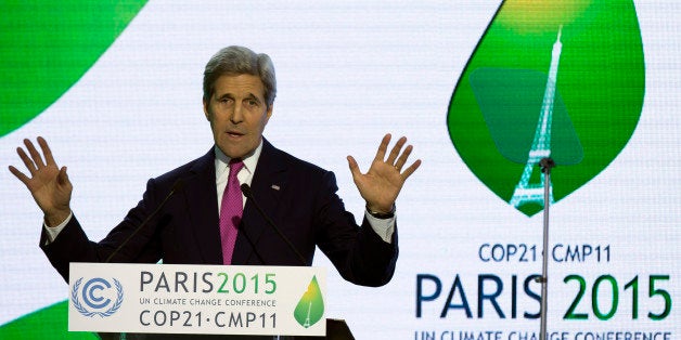 U.S Secretary of State John Kerry delivers his speech during a news conference at the COP21 Climate Conference in Le Bourget, north of Paris, France, Wednesday, Dec. 9 2015. Kerry is announcing that the United States will double its commitment to helping vulnerable nations adapt to climate change impacts such as increased extreme weather events. (Ian Langsdon, Pool via AP)