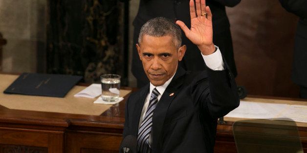 UNITED STATES - JANUARY 12 - President Barack Obama waves during his final State of the Union to a joint session of Congress in the House Chamber on Capitol Hill in Washington, Tuesday, Jan. 12, 2016. Behind him Vice President Joe Biden and House Speaker Paul Ryan listen. (Photo By Al Drago/CQ Roll Call)