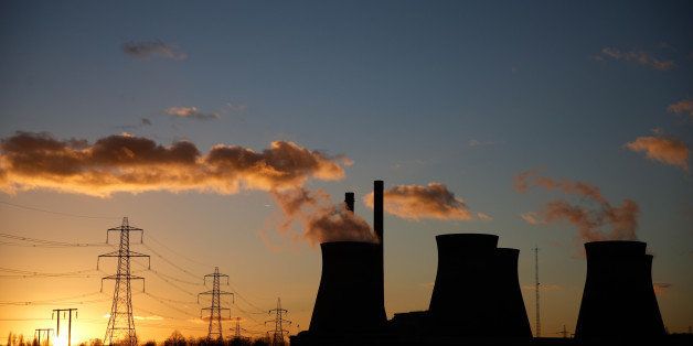 Cooling towers emit vapor at Ferrybridge coal fired power station, operated by SSE Plc, in Ferrybridge, U.K., on Wednesday, Feb. 10, 2016. By the end of March, SSE Plc will probably have closed almost all its coal generation in the U.K. after the clean-dark spread, a measure of the profitability of burning the fuel, turned negative. Photographer: Matthew Lloyd/Bloomberg via Getty Images
