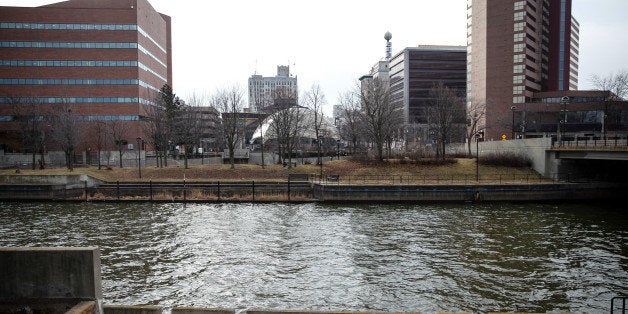 FLINT, MI - FEBRUARY 7: The Flint River with downtown behind is shown on February 7, 2016 in Flint, Michigan. Months ago the
