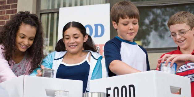 Kids volunteering at food drive