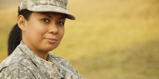 'Portrait of a female military soldier in Army Combat Uniform, Universal Camouflage Pattern or ACU.THIS IMAGE IS ONLY AVAILAB