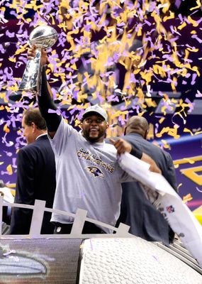 Chykie Brown Confetti Snow Angel: Ravens CB Celebrates Super Bowl Victory  (GIF)