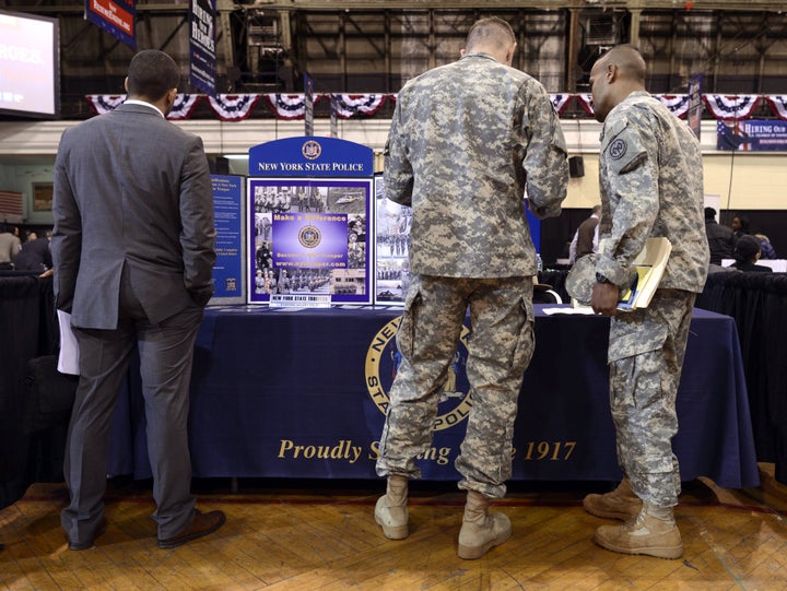 Soldiers at the New York State Police booth during the “Hiring Our Heroes – New York,” hiring fair for veterans and militar