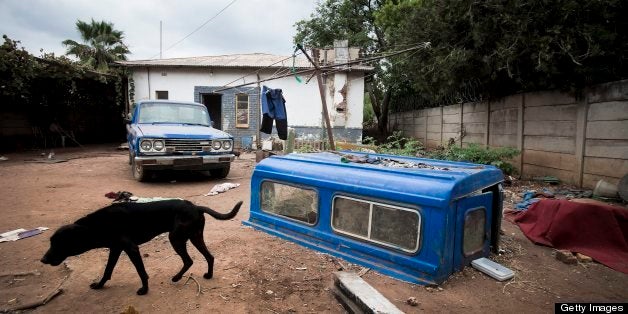 PRETORIA, SOUTH AFRICA - FEBRUARY 25: (SOUTH AFRICA OUT) General view of a squatter's house in Daspoort on February 25, 2013, in Pretoria, South Africa. The phenomenon of informal settlements in South Africa inhabited by Afrikaners has become more commonplace as the number of unemployed has more than doubled in the last 15 years. There are around 70 squatter camps in Pretoria. The 11 tenants on this property pay between R700 and R1000 rent a month to live in shared wooden shacks that do not have water or electricity. (Photo by Daniel Born/The Times/Gallo Images/Getty Images)