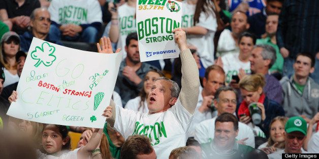 BOSTON, MA - APRIL 26: Fans holding up Boston Strong Signs during the Boston Celtics against the New York Knicks during Game Three of the Eastern Conference Quarterfinals on April 26, 2013 at the TD Garden in Boston, Massachusetts. NOTE TO USER: User expressly acknowledges and agrees that, by downloading and or using this photograph, User is consenting to the terms and conditions of the Getty Images License Agreement. Mandatory Copyright Notice: Copyright 2013 NBAE (Photo by Brian Babineau/NBAE via Getty Images)