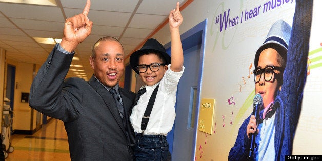 NEW YORK, NY - MAY 09: Former New York Knicks player John Starks and Malik Naser attend the Garden of Dreams Foundation And New York-Presbyterian/Morgan Stanley Children's Hospital Ribbon Cutting Ceremony at New York Presbyterian Hospital on May 9, 2013 in New York City. (Photo by James Devaney/WireImage)