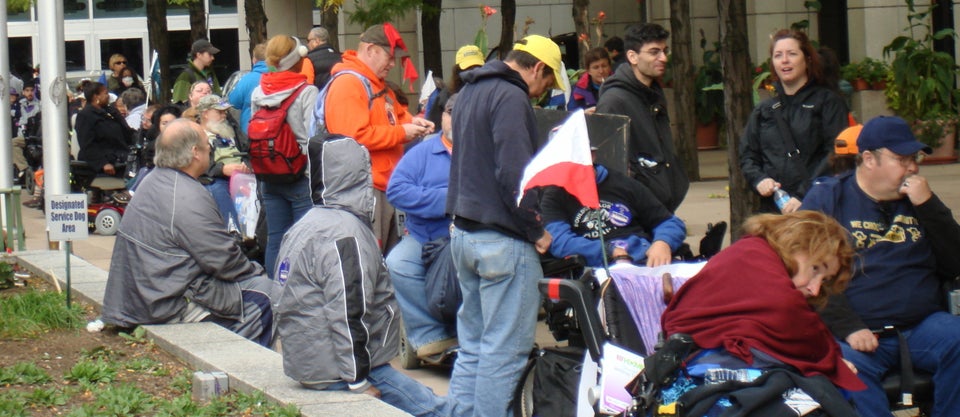 ADAPT activists prepare to march through downtown Harrisburg, Pa., on Oct. 16, 2012.