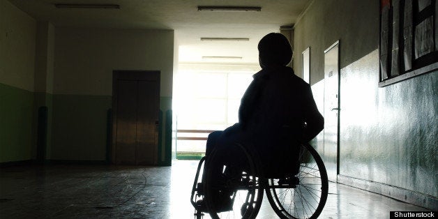 silhouette of handicapped woman ...