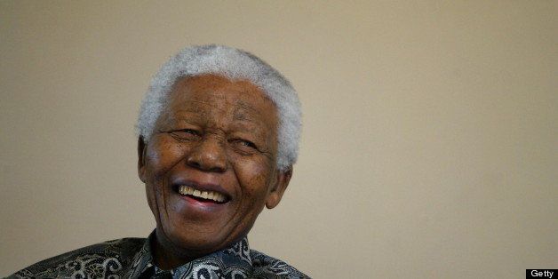 SOUTH AFRICA - JULY 14: Nelson Mandela chuckles during the launch of a comic book called 'Prisoner in the Garden' at the Nelson Mandela Foundation. (Photo by Media24/Gallo Images/Getty Images)