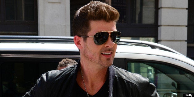 LONDON, UNITED KINGDOM - JULY 09: Robin Thicke sighted arriving at BBC Radio Two on July 9, 2013 in London, England. (Photo b