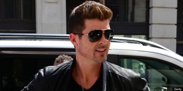 LONDON, UNITED KINGDOM - JULY 09: Robin Thicke sighted arriving at BBC Radio Two on July 9, 2013 in London, England. (Photo by Harlem Mepham/FilmMagic)