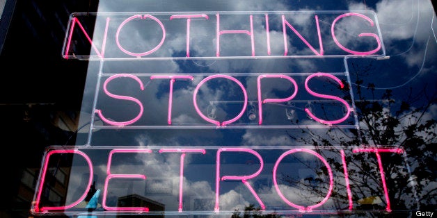 DETROIT, MI - JULY 19: A Detroit merchandise store sign is seen in a window in downtown Detroit July 19, 2013 in Detroit, Michigan. Detroit's emergency manager Kevin Orr filed for Chapter 9 bankruptcy yesterday, July 18th, making it the largest city to file for bankruptcy in U.S. history. The city owes its approximately 100,000 creditors between $18 and $20 billion. (Photo by Bill Pugliano/Getty Images)