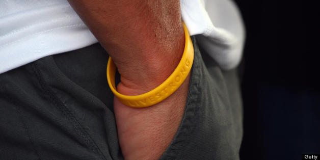Picture shows the Livestrong bracelet on Seven-time Tour de France winner USA's Lance Armstrong wrist during the 19th stage of the 94th Tour de France cycling race, an individual time trial between Cognac and Angouleme, 28 July 2007. AFP PHOTO / JOEL SAGET (Photo credit should read JOEL SAGET/AFP/Getty Images)