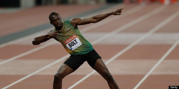 LONDON, ENGLAND - JULY 26: Usain Bolt of Jamaica celebrates after crossing the line first in the Men's 100m A race on day on