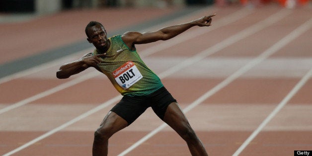 LONDON, ENGLAND - JULY 26: Usain Bolt of Jamaica celebrates after crossing the line first in the Men's 100m A race on day one during the Sainsbury's Anniversary Games - IAAF Diamond League 2013 at The Queen Elizabeth Olympic Park on July 26, 2013 in London, England. (Photo by Harry Engels/Getty Images)